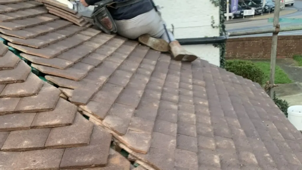 A newly tiled roof by Masters Roofing with the ridge bedded and the verge finished