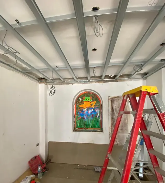 New metal stud partitions and ceiling framing going in during the conversion